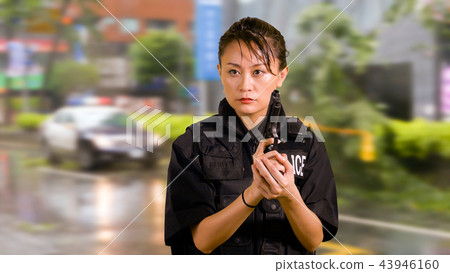 Asian American Police Officer at Crime scene  43946160
