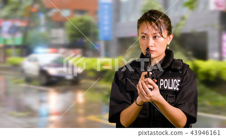 Asian American Police Officer at Crime scene  43946161