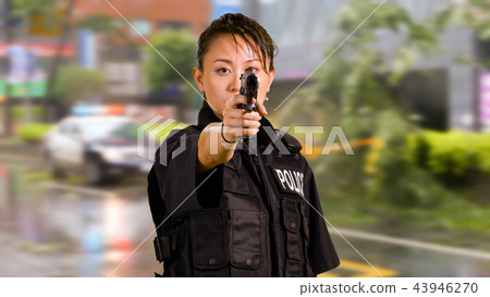 Asian American Police Officer at Crime scene  43946270