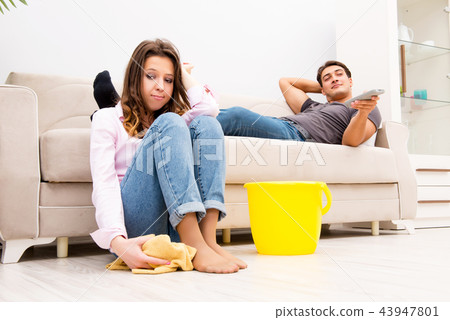 Young family doing cleaning at home Young family doing cleaning at home 43947801