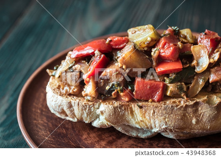 Sandwich with ratatouille on the plate 43948368