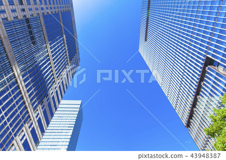Landscape of the office town looking up at a skyscraper Landscape of the office town looking up at a skyscraper 43948387