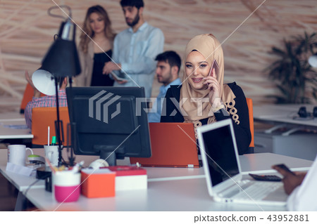 young creative startup business people on meeting at modern office making plans and projects 43952881