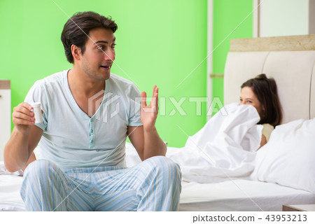 Man using pills for woman satisfaction Man using pills for woman satisfaction 43953213
