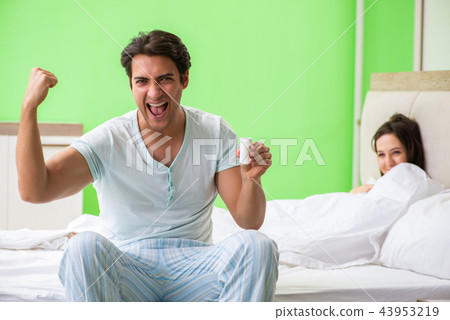 Man using pills for woman satisfaction   43953219