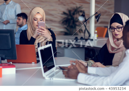 young creative startup business people on meeting at modern office making plans and projects 43953234