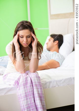 Woman and man in the bedroom after conflict 43953912