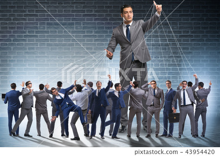 Boss employee manipulating his staff in business concept 43954420