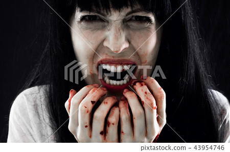 Halloween horror. Crazy bloody scary zombie woman 43954746