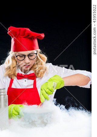 Woman animator cook doing experiments Woman animator cook doing experiments 43955022