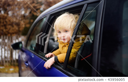 Cute little boy ready for a roadtrip or travel Cute little boy ready for a roadtrip or travel 43956005