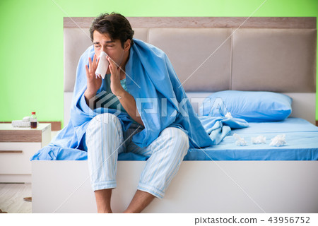 Man suffering from sleeping disorder and insomnia 43956752