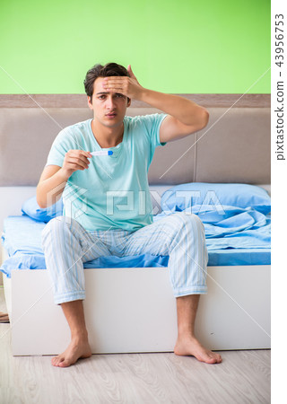 Man suffering from sleeping disorder and insomnia 43956753