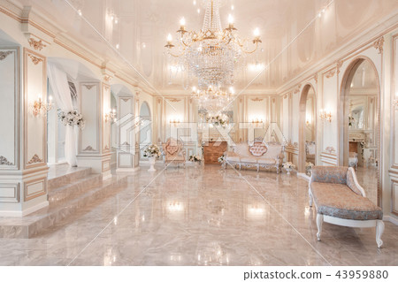 daylight in the interior and light of electric lamps. Morning in luxurious light interior in mansion 43959880