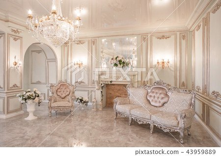 daylight in the interior and light of electric lamps. Morning in luxurious light interior in mansion daylight in the interior and light of electric lamps. Morning in luxurious light interior in mansion 43959889
