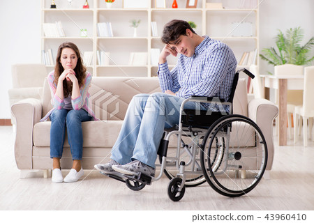 Desperate disabled person on wheelchair 43960410