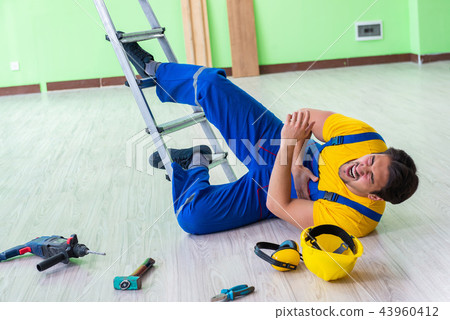 Injured worker at the work site 43960412