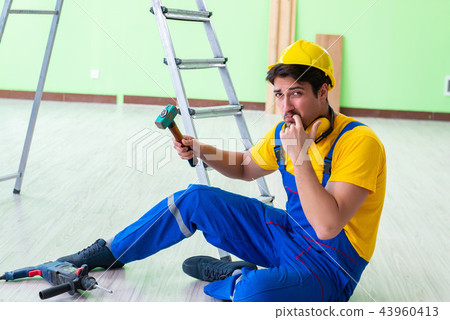 Injured worker at the work site 43960413