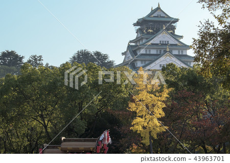 Autumn scenery with a little of the roof of Osaka Castle in autumn. Autumn scenery with a little of the roof of Osaka Castle in autumn. 43963701