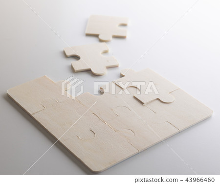 Last piece of wooden jigsaw is for business Last piece of wooden jigsaw is for business 43966460