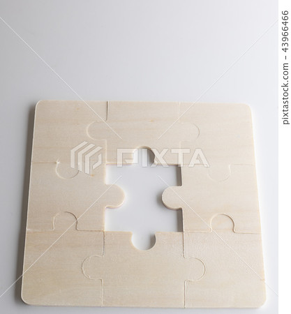 Last piece of wooden jigsaw is for business Last piece of wooden jigsaw is for business 43966466