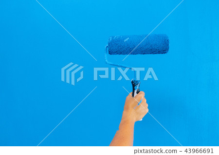 Someone painting wall 43966691