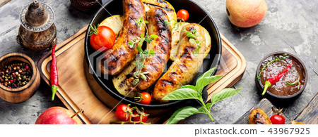 Grilled sausages in frying pan Grilled sausages in frying pan 43967925