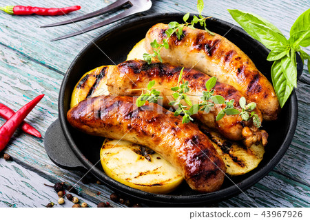 Grilled sausages in frying pan Grilled sausages in frying pan 43967926