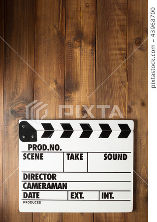 movie clapper board at wooden background 43968700