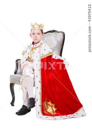 Little boy wearing costume of a king 43970418