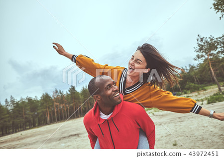 Happy man and woman having fun together 43972451