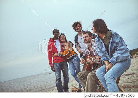 Smile guy singing songs under the guitar 43972506
