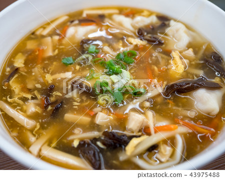 Hot and sour soup dumplings 43975488