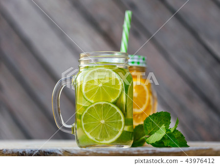 Lemonade in a glass jar 43976412
