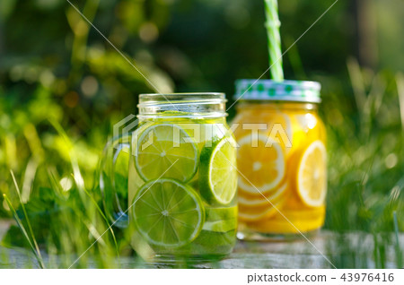 Lemonade in a glass jar Lemonade in a glass jar 43976416