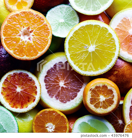 Mix of different citrus fruits closeup 43976476