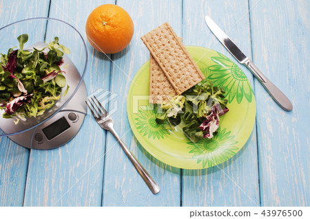Delicious salad of green herbs on a plate, Delicious salad of green herbs on a plate, 43976500
