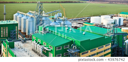 Modern silos for storing grain harvest. Agriculture. Background. Modern silos for storing grain harvest. Agriculture. Background. 43976742