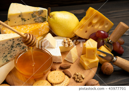 slices of cheese brie or camembert with croissants 43977701