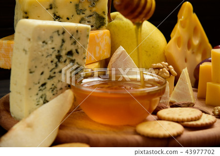 slices of cheese brie or camembert with croissants 43977702