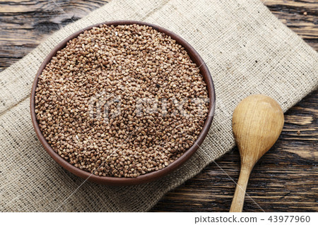 raw buckwheat in a plate 43977960