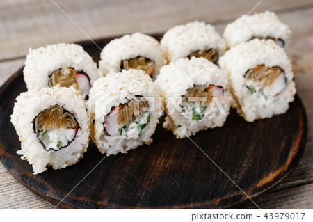 Sushi rolls with crab meat, restaurant serving 43979017