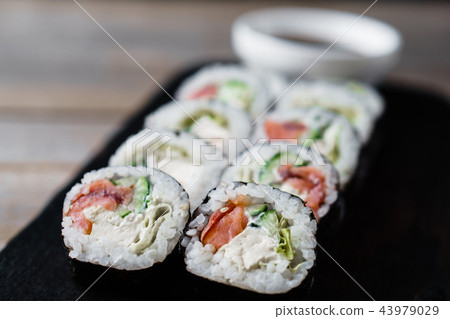 Japanese sushi rolls served on wooden tray 43979029