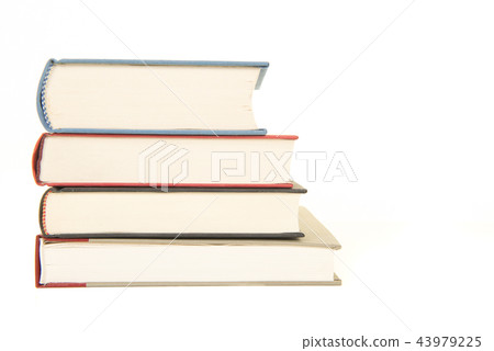Straight staple of four books seen from the front  Straight staple of four books seen from the front  43979225
