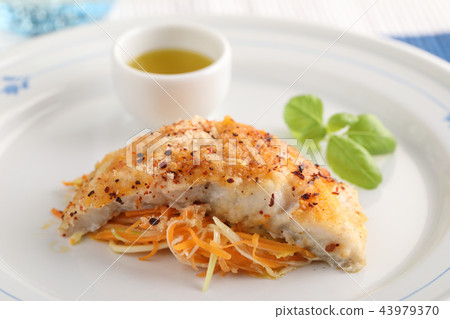 Baked cod with vegetables Baked cod with vegetables 43979370