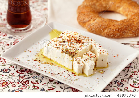Diced Feta cheese with spices Diced Feta cheese with spices 43979376