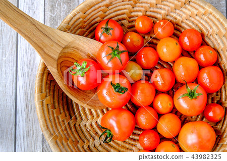 Tomatoes in a basket 43982325