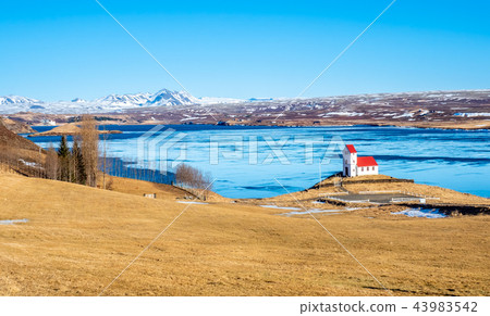 Ulfljotfvatnskirkja, church on lake, Iceland Ulfljotfvatnskirkja, church on lake, Iceland 43983542
