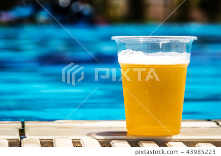 Swimming pool and beer Swimming pool and beer 43985223