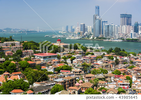 aerial view of Gulangyu island with Xiamen skyline aerial view of Gulangyu island with Xiamen skyline 43985645